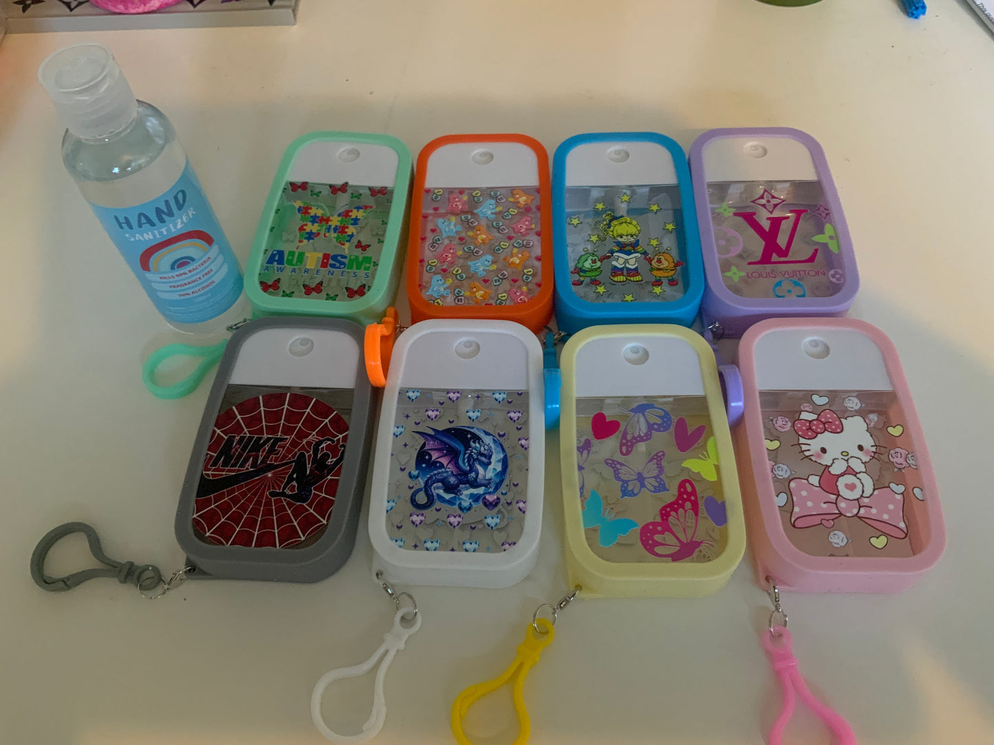 Sanitiser keyrings & 100ml bottle fragrance free sanitiser